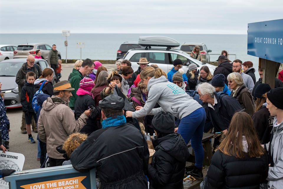 Volunteers queuing to sign in