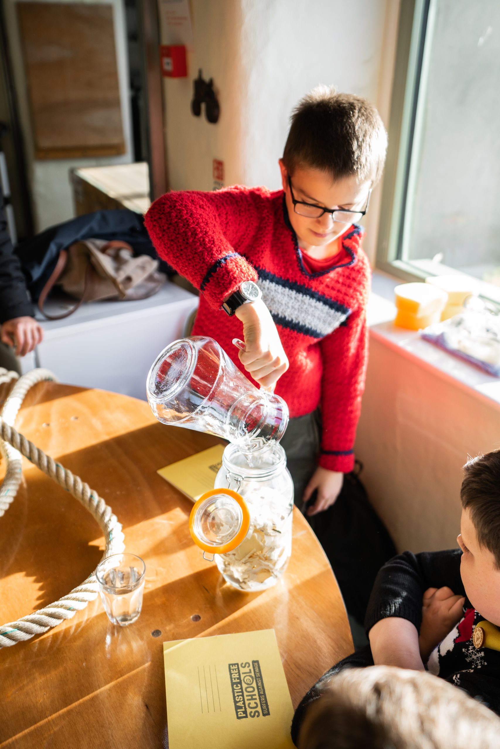 In ‘The Science of Plastic’ lesson, pupils conduct an experiment using plastic and water. Photo by Jack Abbott.