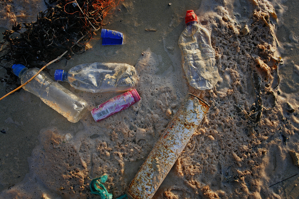 Plastic litter on a sandy beach